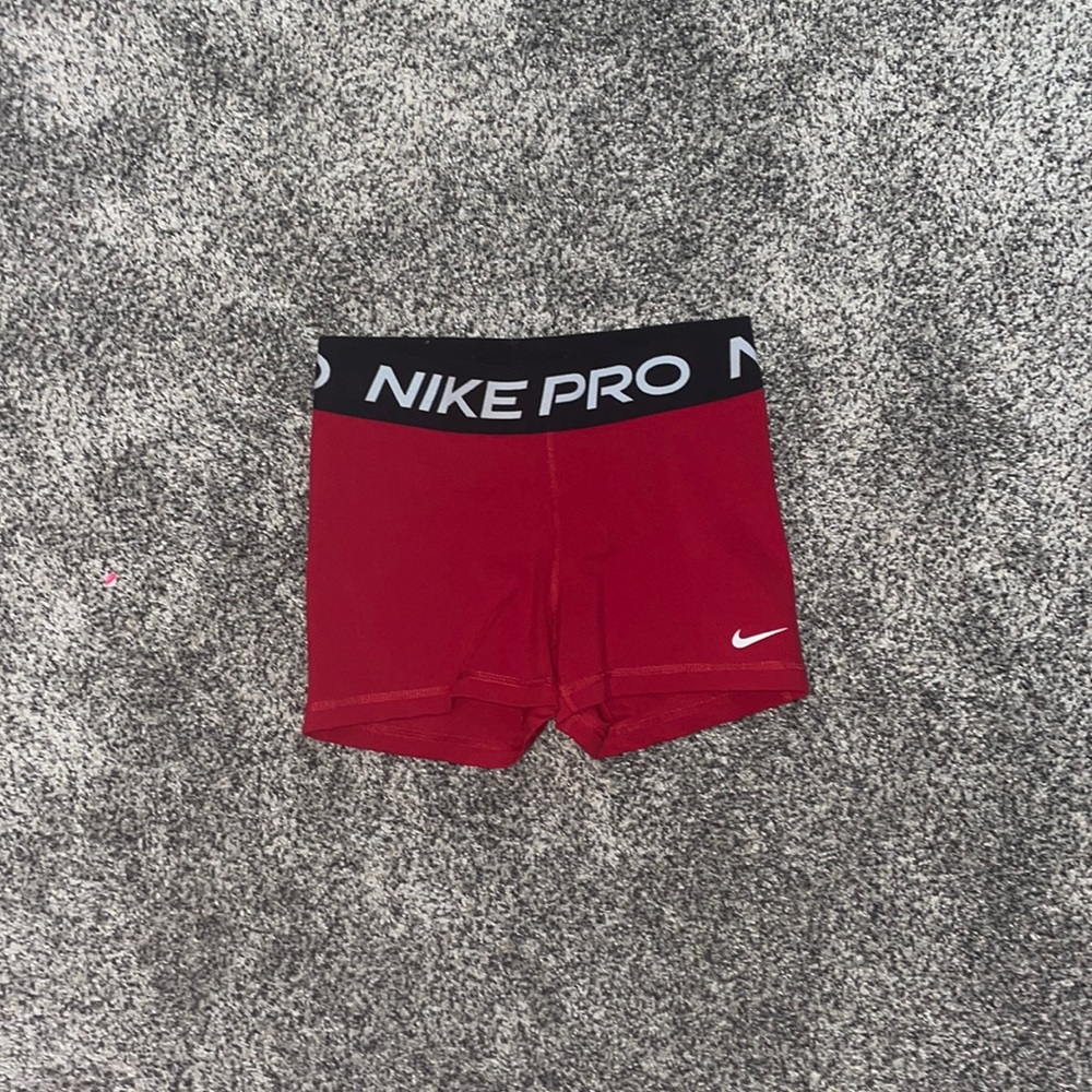 Red Nike Pros. Size Small Women’s.